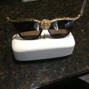 sunglasses gold and black Anna-karin Karlsson Lion sunglasses exotic